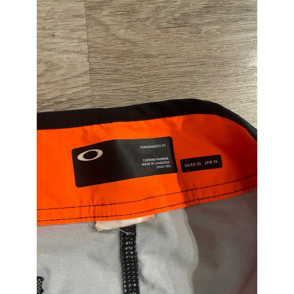 Oakley Geo Ellipse 18 Boardshorts Mens 33 Black Orange 482446-02E Surf Swim
